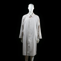 Florentino - Rain coat - Ivory - Size M - Long coat with a single visible top button and hidden front placket. Features a classic pointed collar, side pockets, and button-tab cuffs.