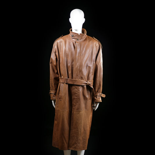 Eschel Krag - Trench coat - Brown - Size 48 - Long coat with a high stand collar, belted waist, and shoulder epaulets. Features wrist straps and a concealed front closure.