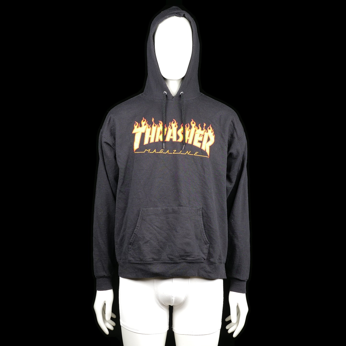 San Francisca - Hoodie - Black - Size L - Black hoodie with a kangaroo pocket and colorful flame "THRASHER MAGAZINE" graphic print on the front. It features ribbed cuffs and hem with adjustable drawstrings on the hood.