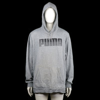 Puma - Hoodie - Light Gray - Size XXL - Light gray hoodie with a large black printed logo on the chest and a front kangaroo pocket. Features ribbed cuffs, a straight hem, and an adjustable drawstring hood.