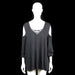 Ms Mode - Tunic - Black - Size 2XL - Black cold-shoulder tunic with crisscross straps at the deep V-neckline. Features tiered flared cuffs and a relaxed fit.