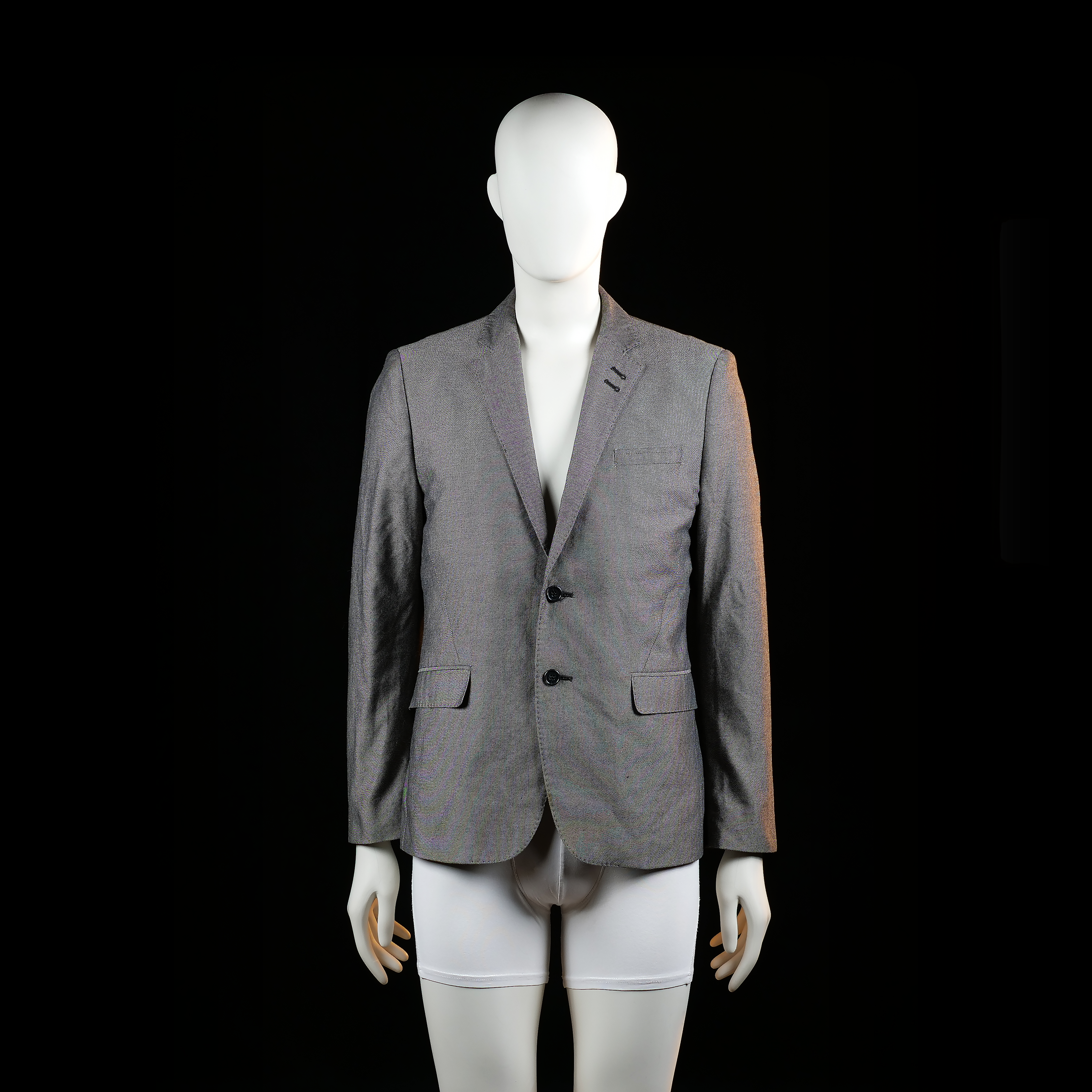 H&M - Blazer - Gray & Black - Size 48 - Two-button blazer with flap pockets and a welt chest pocket, featuring dark contrasting elbow patches. Single vent at the back and buttoned cuffs.