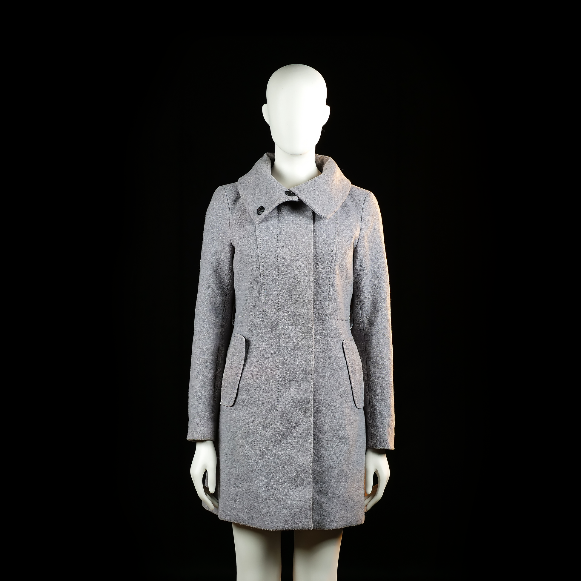 H&M - Overcoat - Light Gray - Size 34 - Light gray coat with a flared hemline, front flap pockets, and a wide high collar secured by an off-center button. Vertical seam detailing runs from the shoulders to the waist.