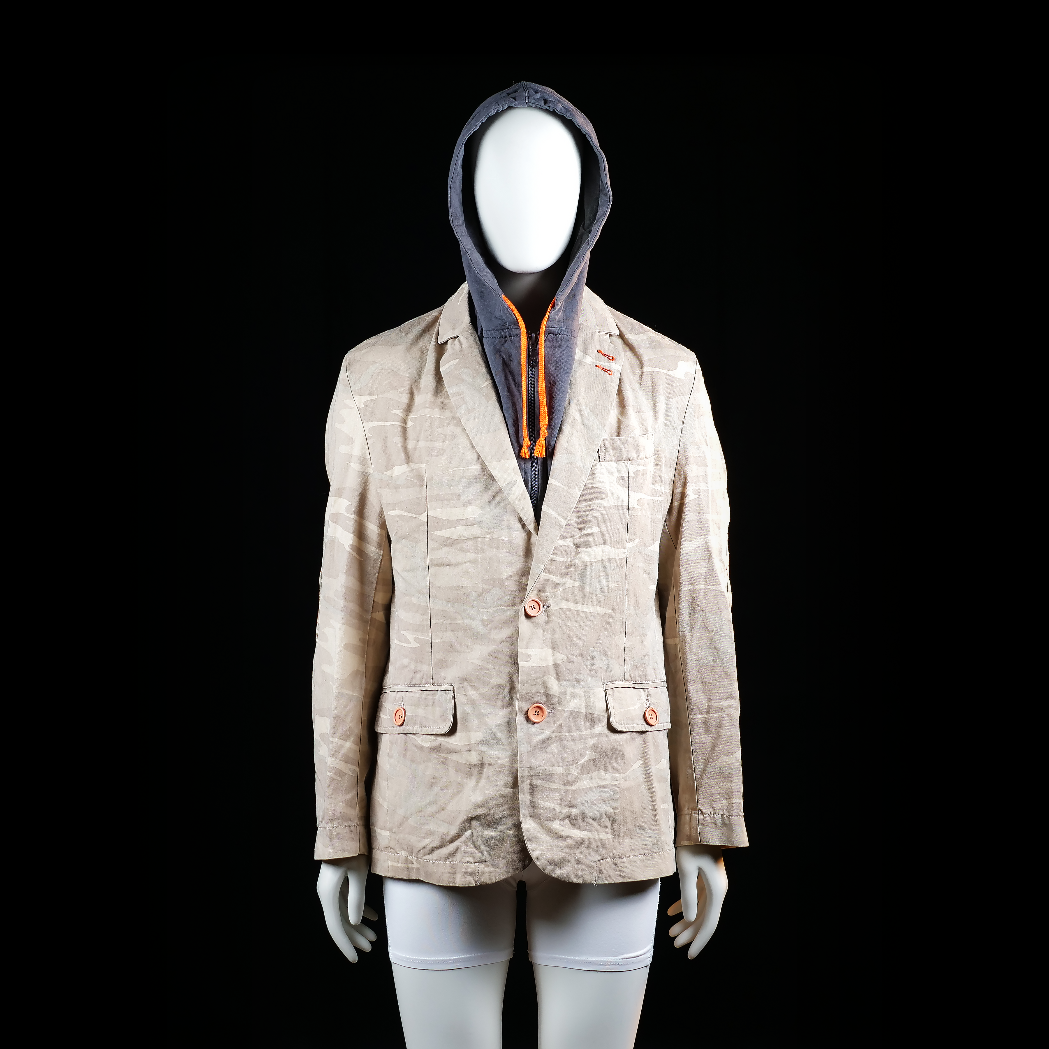 Golden Blazer - Blazer - Beige & Dark Gray - Size L - Single-breasted blazer with all-over light camouflage print, two-button closure, and flap pockets. Features quilted elbow patches with visible orange stitching and a dark gray layered hooded insert with orange drawstrings.