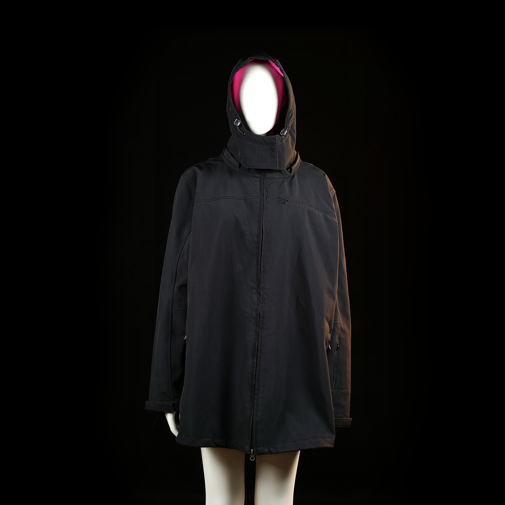 Janina - Rain coat - Black & Pink - Size 50 - Long black hooded coat with a high collar and zip front closure. Features two zippered side pockets and visible pink lining inside the hood.