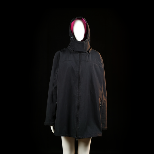 Janina - Rain coat - Black & Pink - Size 50 - Long black hooded coat with a high collar and zip front closure. Features two zippered side pockets and visible pink lining inside the hood.