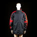 Berglund - Windbreaker - Black & Red - Size 2XL - Long-length jacket with a high collar, front zipper with snap button placket, and elastic cuffs. Features color-block red panels on the sleeves with thin horizontal white piping.