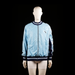 Santini - Bomber jacket - Light Blue & Navy - Size M - Light blue zip-up bomber jacket with dark blue ribbed collar, cuffs, and hem. The sleeves and upper back are light blue, while the side panels and lower back are dark blue fabric with a zip pocket.
